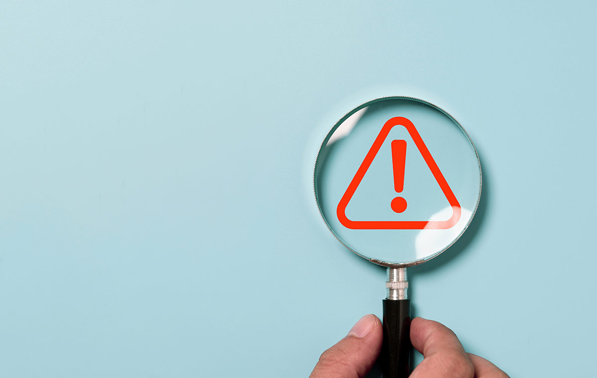 magnifying glass identifying mistake